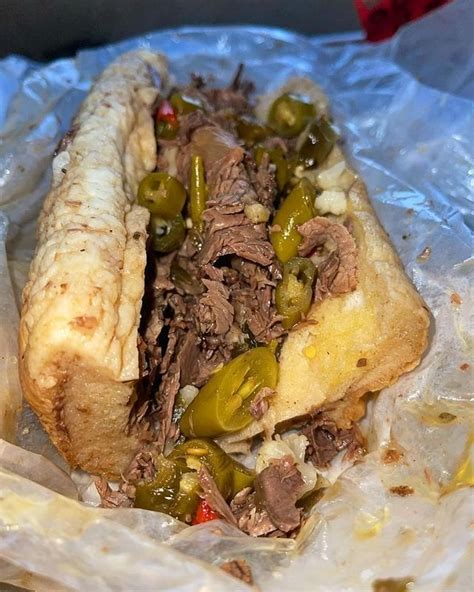 Johnnie's beef - Specialties: Italian Beef, Charcoal-grilled Italian Sausage, Italian Lemonade, Hot Dogs, Tamales (bunch style), and Pepper & Egg Sandwiches.
